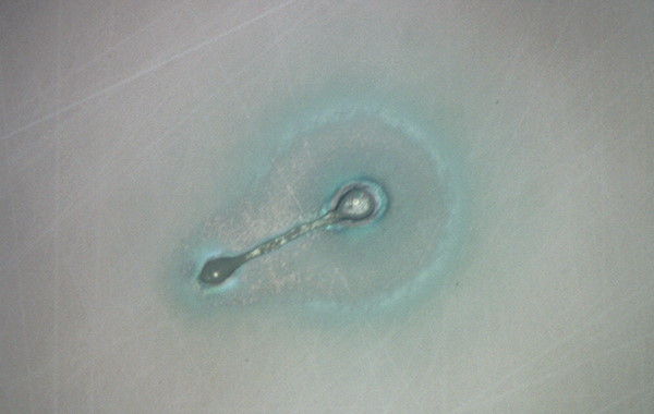 Air inclusion in glass with coaxial light