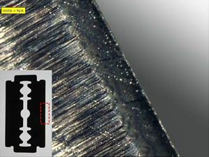 Edge of a razor blade examined with coaxial light